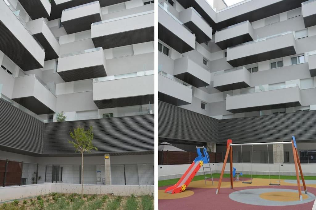 Apartamento Rivascenter Bagian luar foto