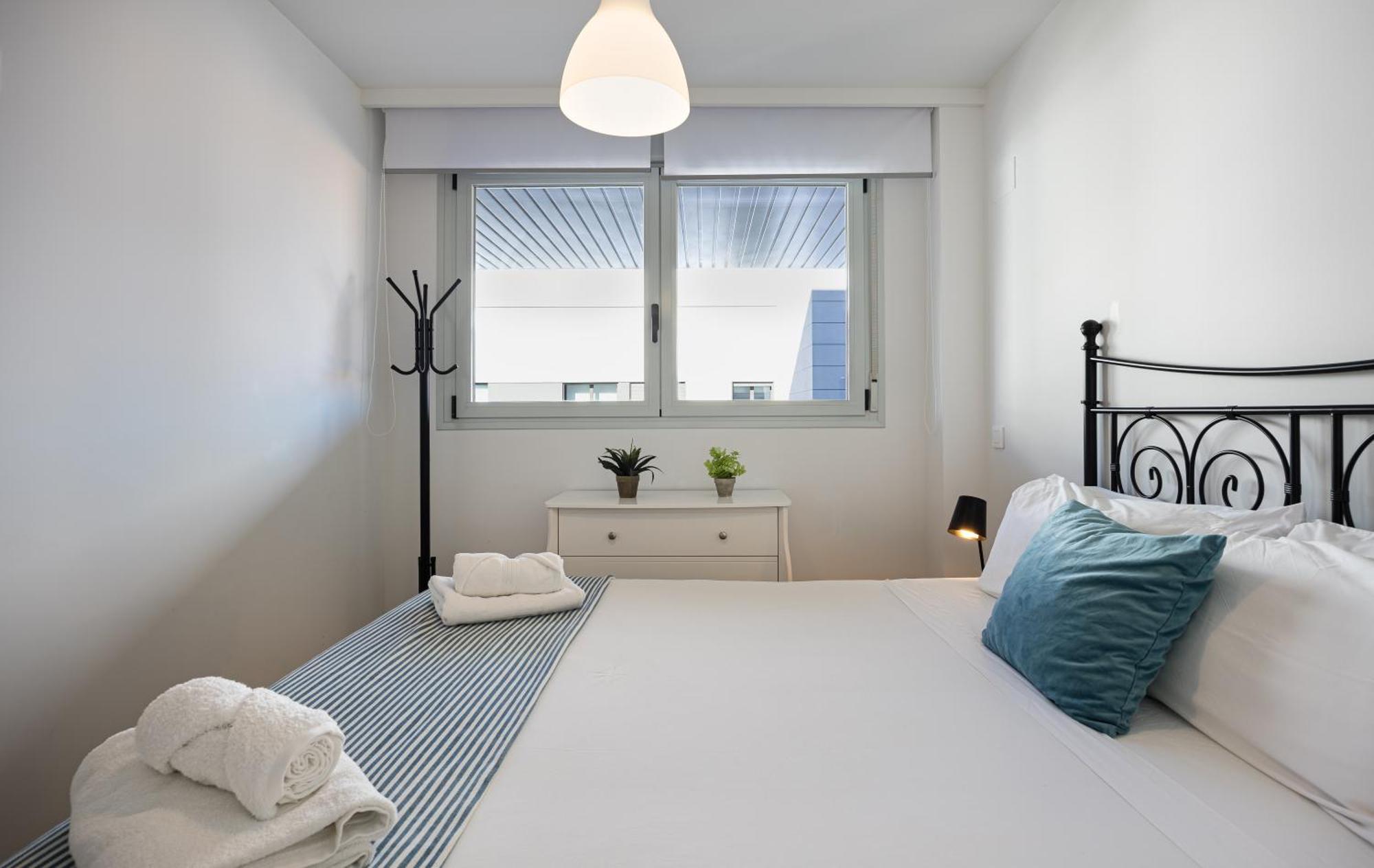 Apartamento Rivascenter Bagian luar foto